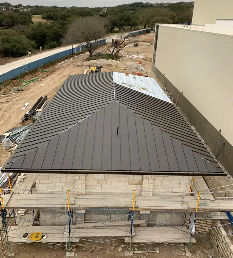 Metal roof new construction with scaffolding in Vero Beach